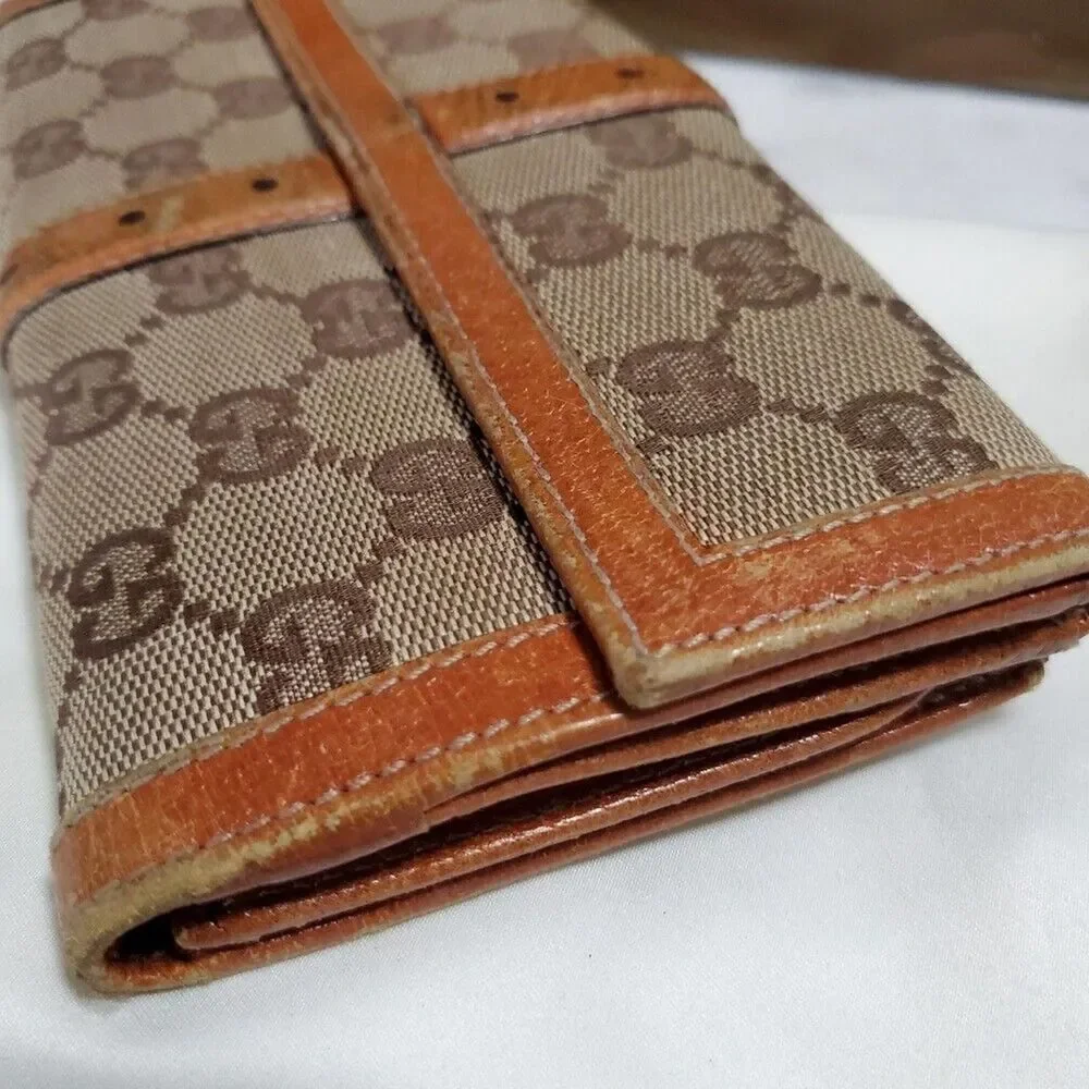 Gucci GG Logo Continental Canvas Tan Bifold Wallet with Leather Trim. 1462012778